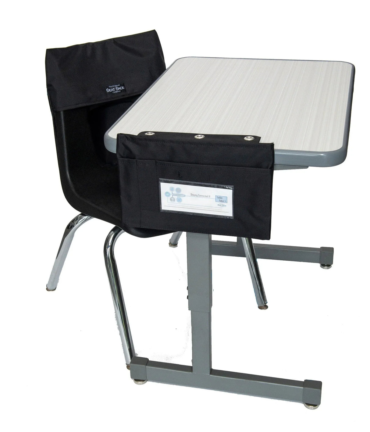 Black tablet storage pouch attached to classroom desk and chair with metal legs