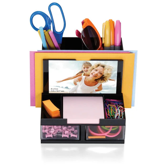 Black desk organizer with scissors, pens, sticky notes, paper clips, folders, and photo holder