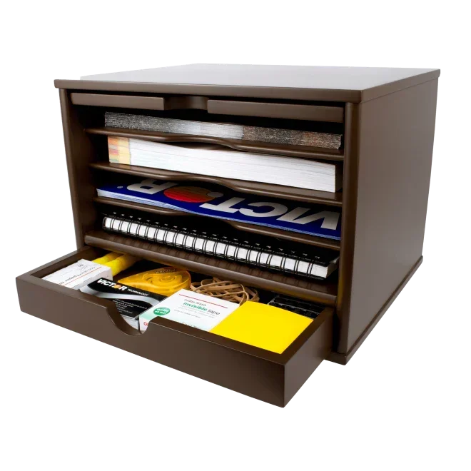 Brown desk organizer with drawers holding notebooks, sticky notes, and office supplies for workspace organization