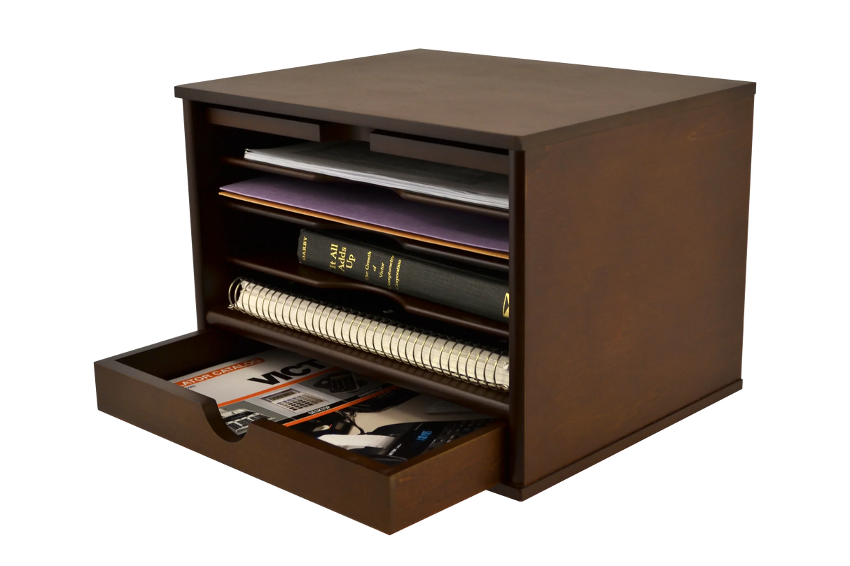 Wooden desktop organizer with drawers holding notebooks, books, and office supplies for workspace organization
