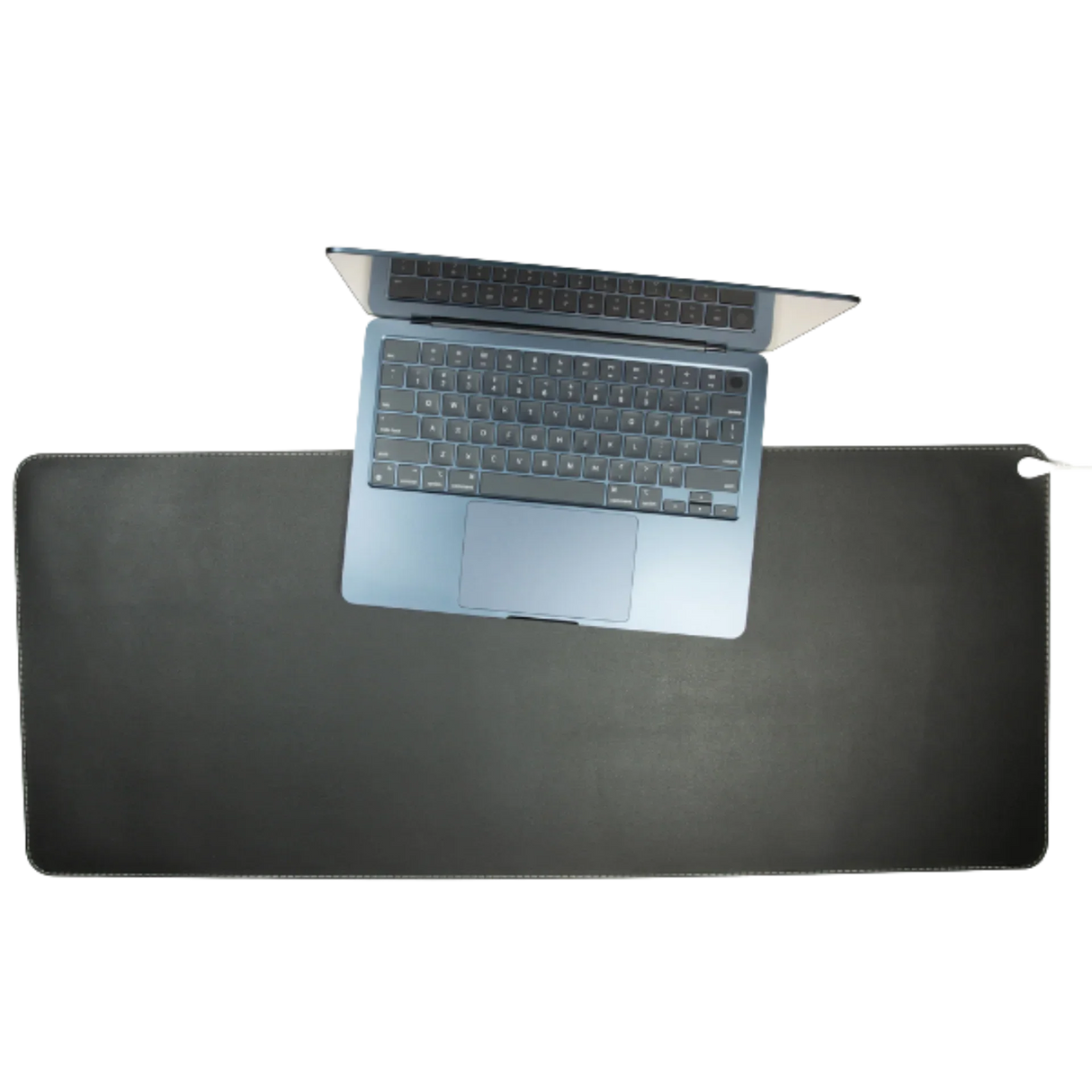 Laptop on large black desk pad for workspace organization and desk protection