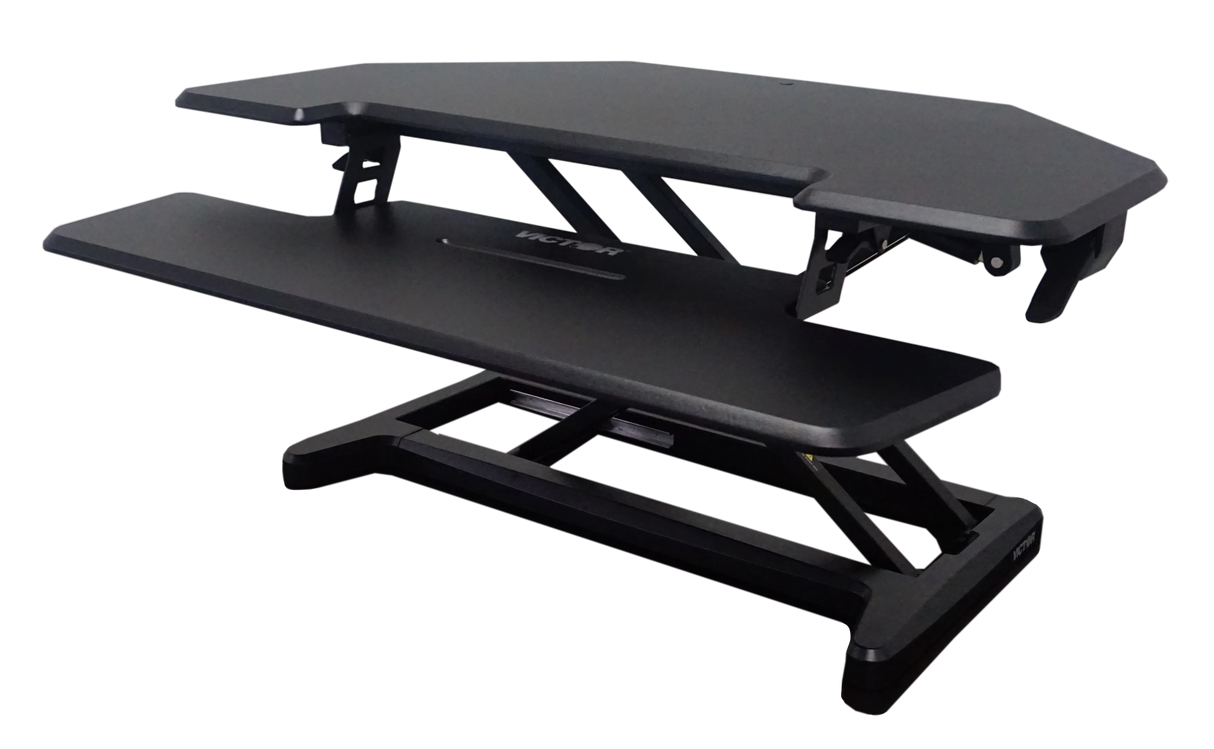 Adjustable height corner standing desk with removable keyboard tray, black finish