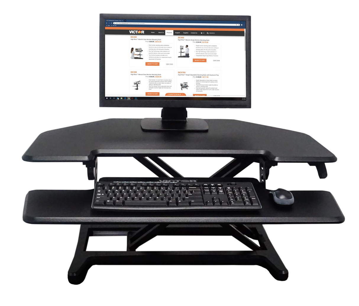 High-rise corner standing desk with removable keyboard tray, monitor, keyboard and mouse