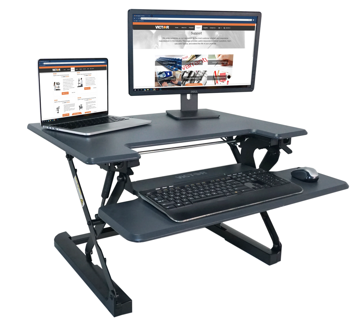 High-rise adjustable standing desk with keyboard tray, laptop, and monitor setup