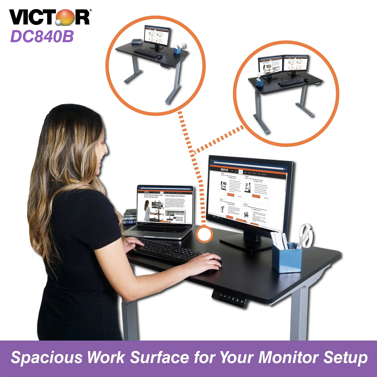 Woman using a black electric adjustable height standing desk with dual monitors in office setting