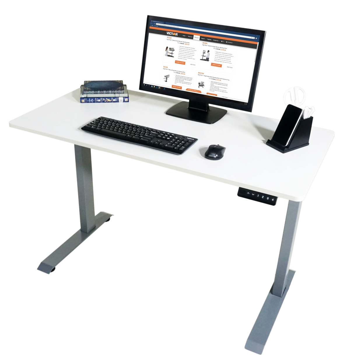 Electric adjustable standing desk with monitor, keyboard, mouse, books, and desk organizer