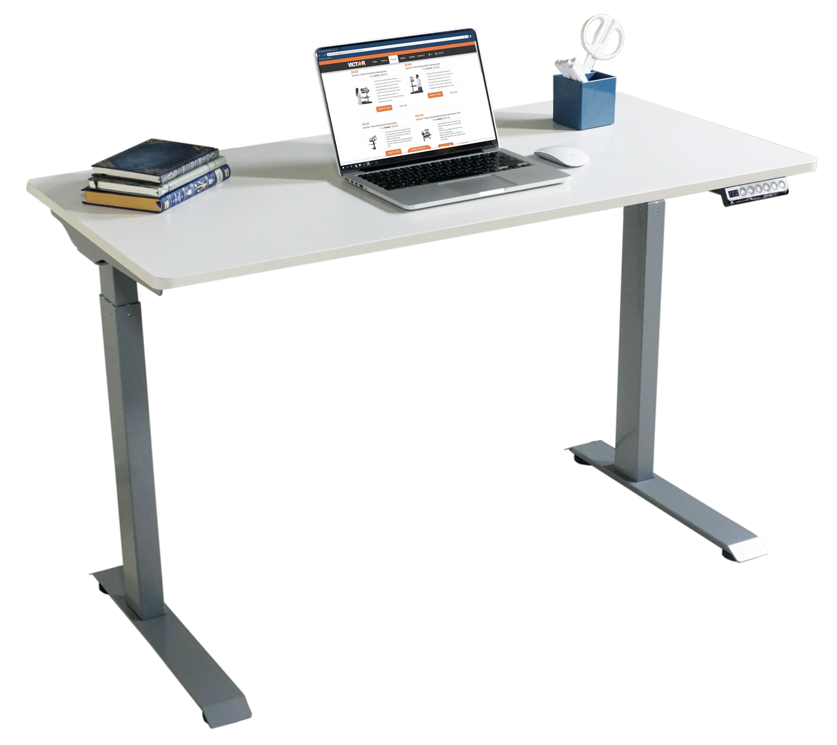 Electric adjustable height standing desk with laptop, books, and office supplies