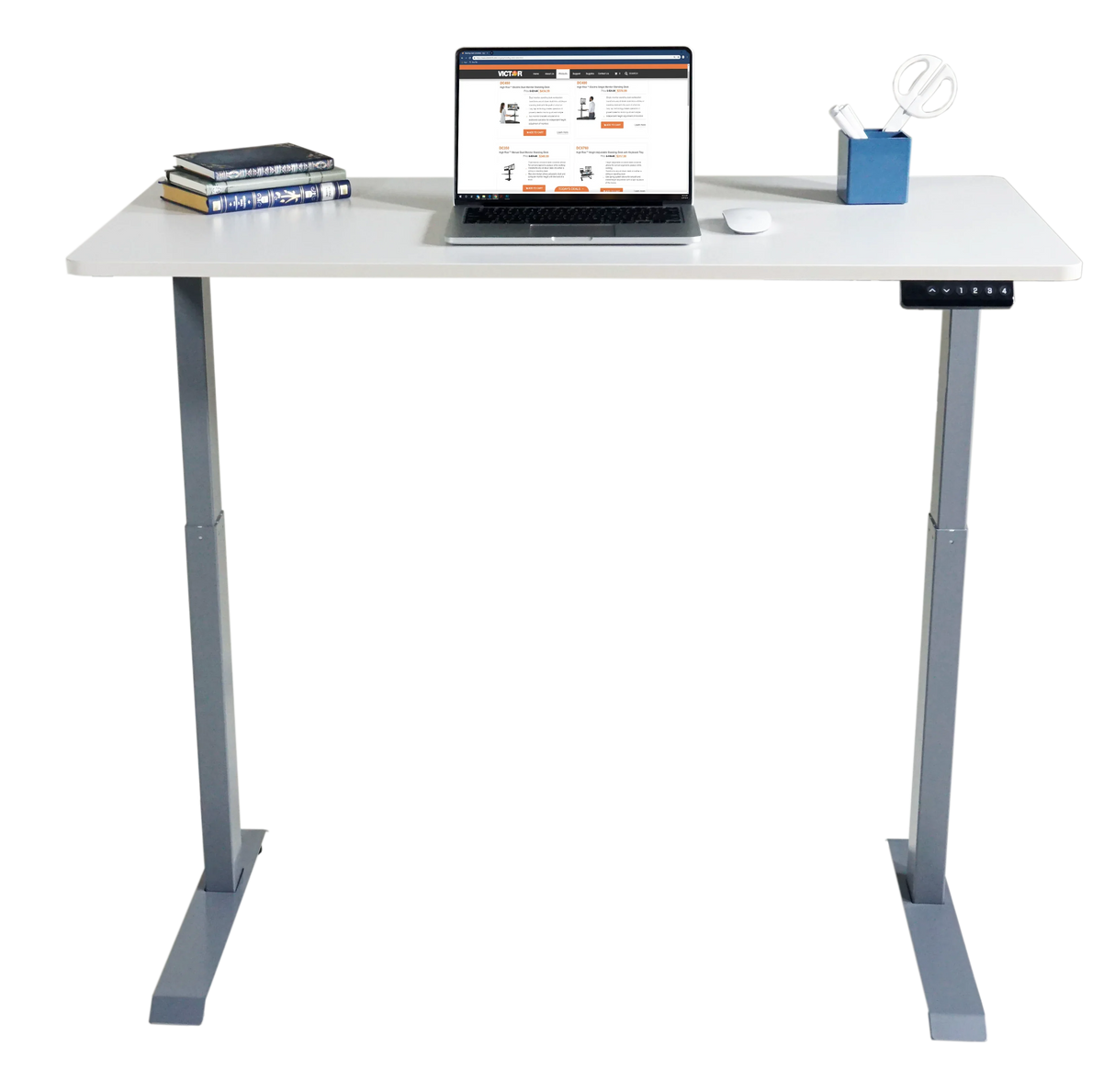 Electric adjustable height standing desk with laptop, books, and desk organizer
