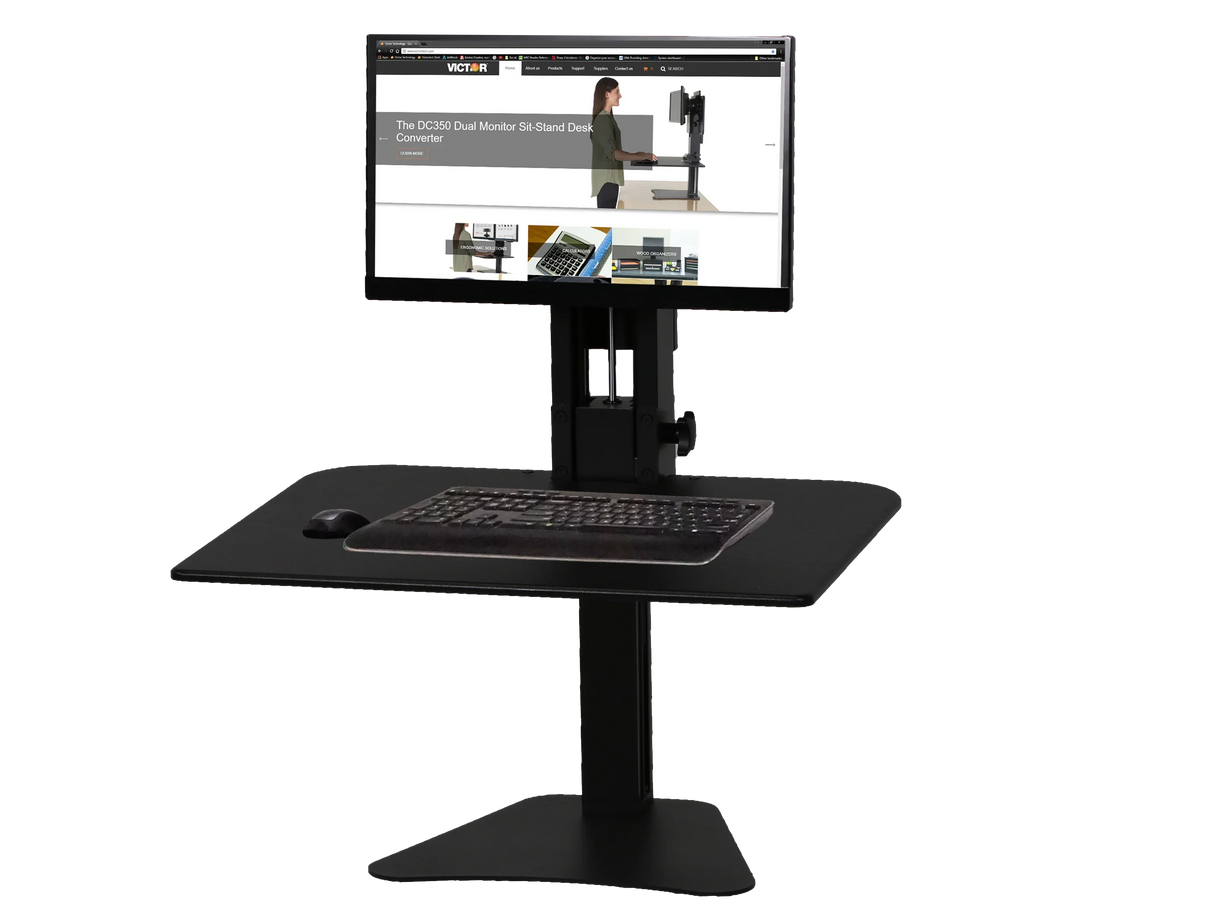 Single monitor standing desk converter with black keyboard and mouse on work surface