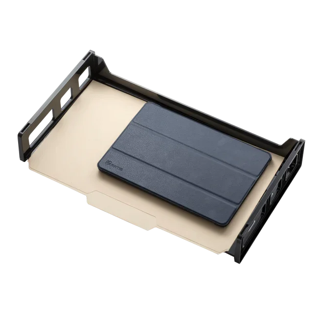 Black metal letter tray with beige file folder and closed black tablet cover