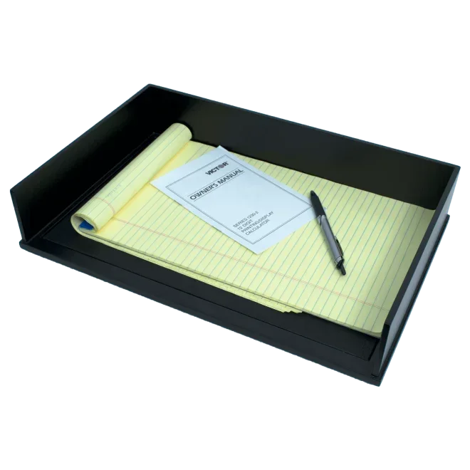 Black desk tray holding yellow legal pad, Victor owner's manual, and pen for office organization