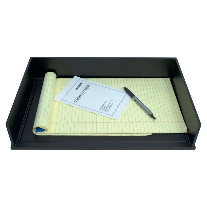 Black desk tray holding yellow legal pad, owner's manual, and pen for office organization