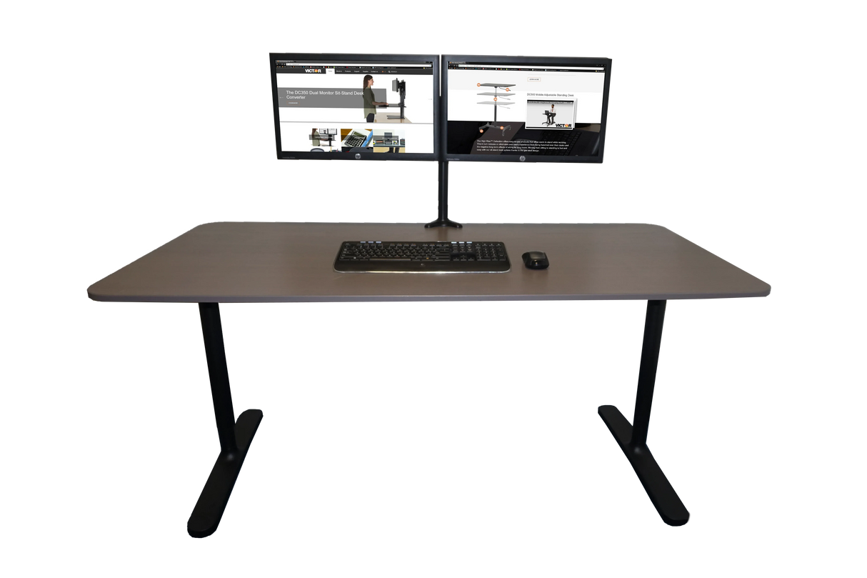 Modern standing desk with dual monitors, keyboard, and mouse for productive office setup