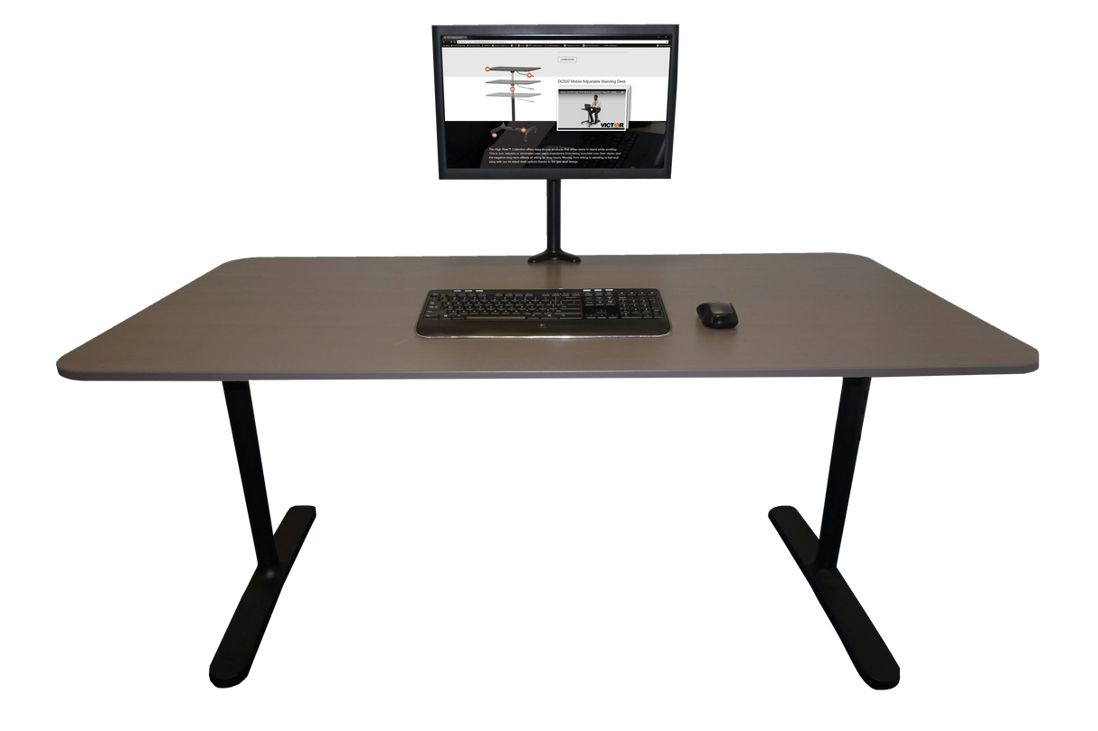 Modern standing desk with monitor, keyboard, and mouse for productive workspace setup