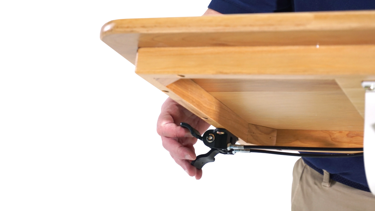 Adjustable wooden standing desk with black clamp mechanism for workspace productivity