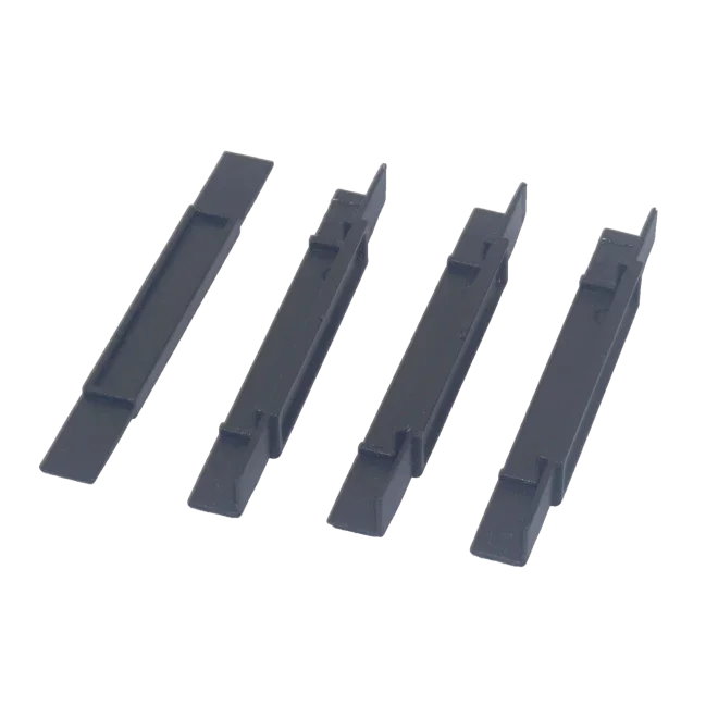 Set of four black plastic tray supports for office desk organizers