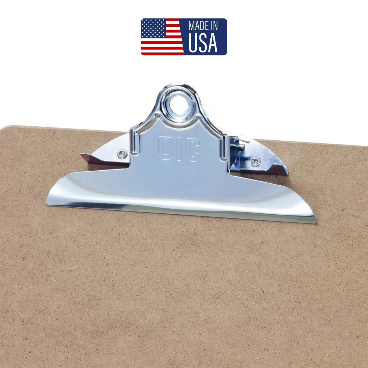 Chrome metal clipboard clip on brown board, Made in USA