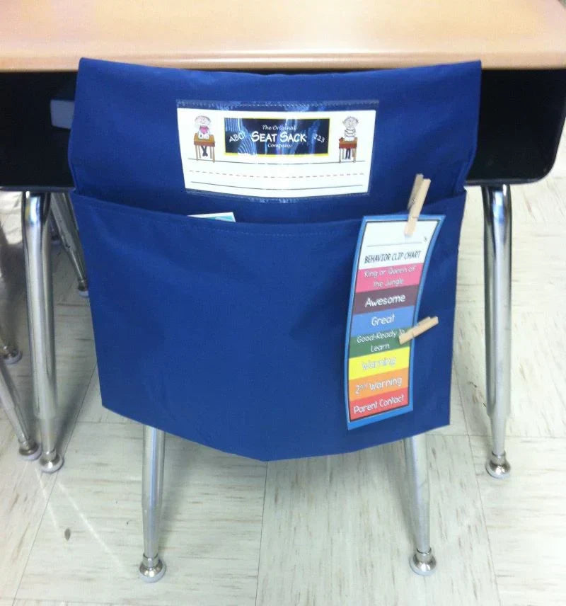 Blue Seat Sack chair pocket with a behavior clip chart attached to the side.