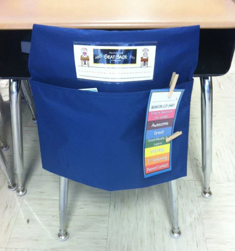 Blue Seat Sack chair pocket with a behavior clip chart attached to the side.