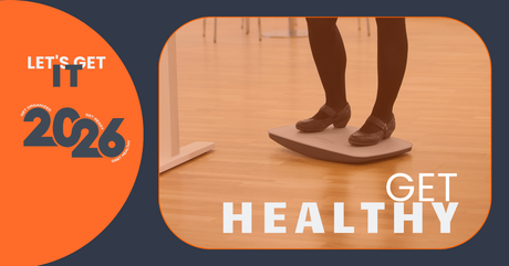 Person standing on balance board at standing desk with 'Get Healthy' text, office setting