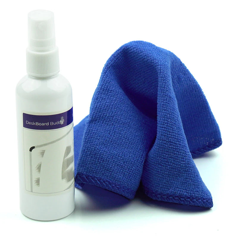 White spray bottle labeled DeskBoard Buddy with blue microfiber cleaning cloth for office surfaces