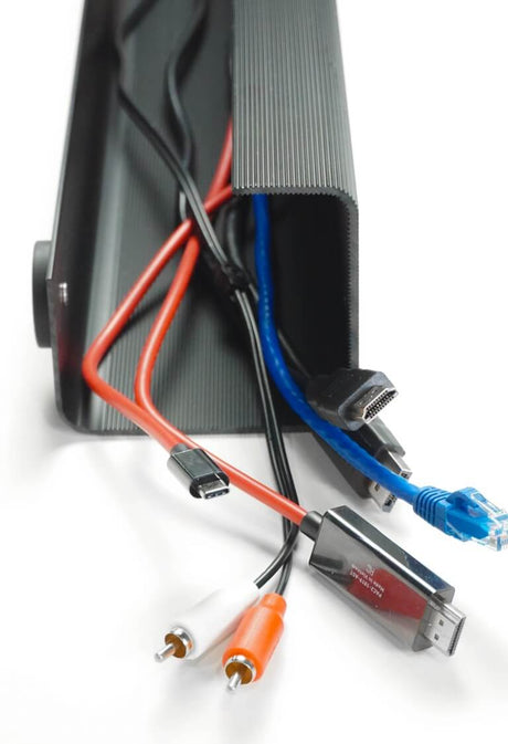 Electronic device with various cables and connectors on a white background