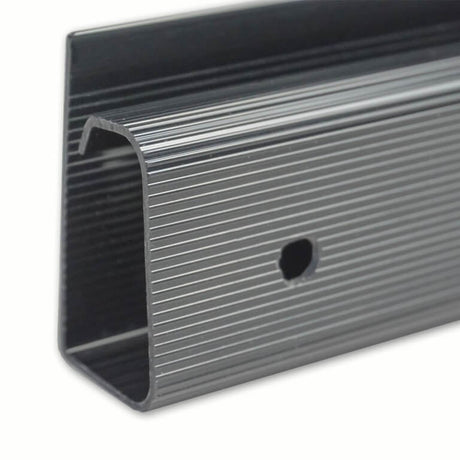 Metallic strip with a ribbed surface on a white background