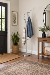Alba silver modern coat stand with five pegs holding a denim jacket and scarf in an entryway.