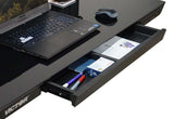 Black desk with open drawer containing office supplies, laptop, and mouse.