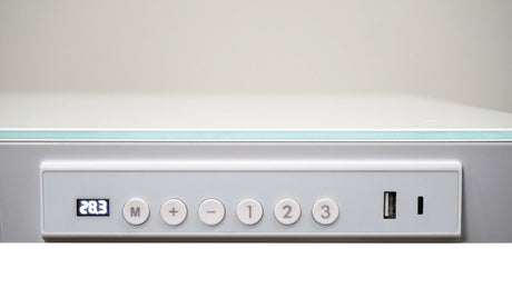 Control panel with buttons and a USB port on a white background