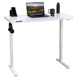 White adjustable desk with laptop, mug, and phone on a white background