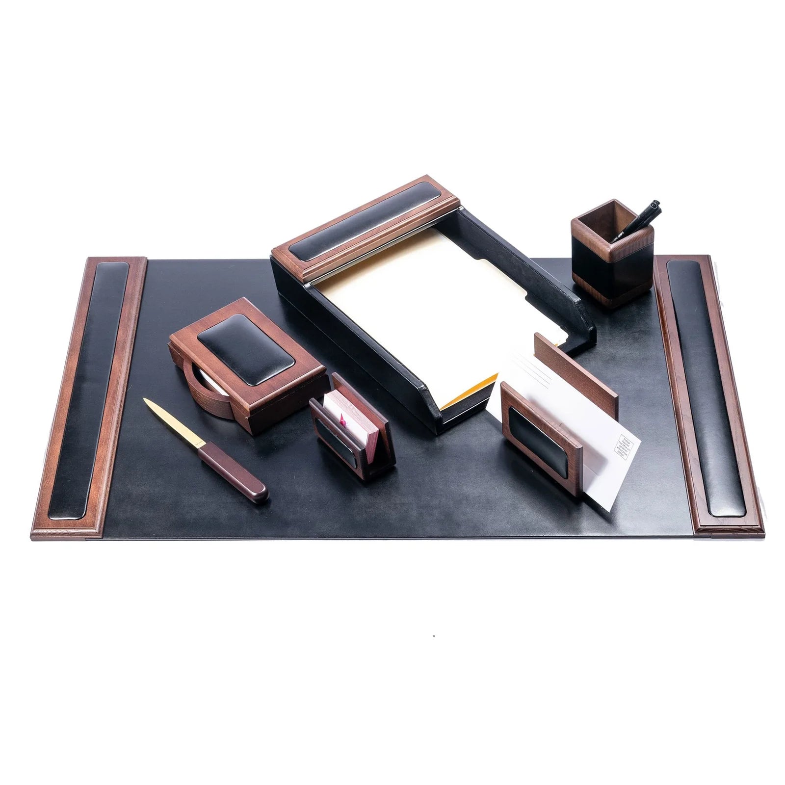 Walnut and black leather 7-piece desk organizer set with tray, pen holder, letter opener, and mat.