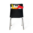 Black Seat Sack on chair filled with school supplies, ruler, folders, and pouch