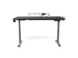 Adjustable standing desk with digital controls and workspace organizer on white background