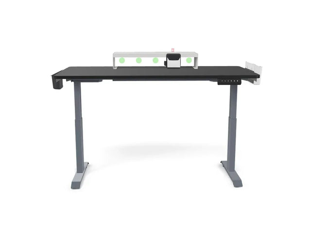 Adjustable standing desk with digital controls and workspace organizer on white background