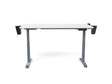 White adjustable standing desk with black side attachments and gray legs on white background