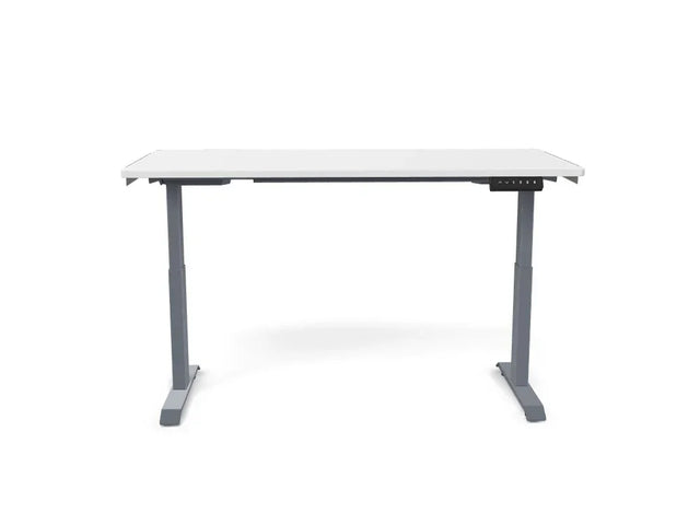 Height adjustable standing desk with gray metal legs and digital controls on white background