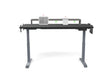 Standing desk with organizer shelf, black tabletop, and metal legs for office workspace