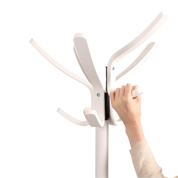 Hand assembling modern white wood coat stand with multiple hooks