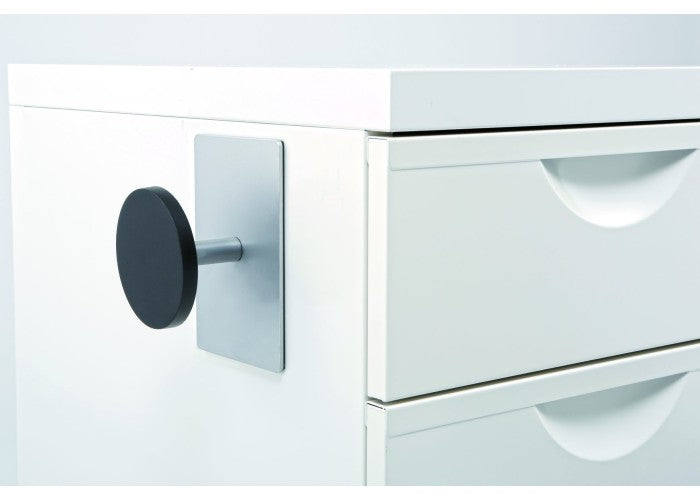 Magnetic black peg hook attached to white office cabinet for organizing workspace items