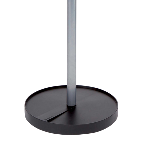 Close-up of a modern garment rack round metal base and upright pole