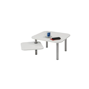 Alba square white coffee table with a rotating top, a coffee mug, and a smartphone