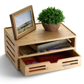 Officemate® Bamboo Organizer with drawer containing books, a photo frame, and a small plant.