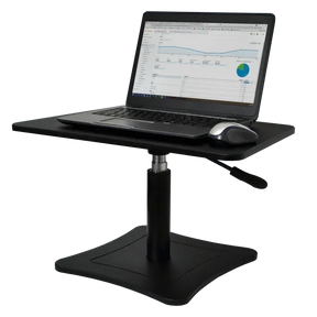 Victor® High Rise™ height adjustable desk converter with a laptop and mouse on a black surface