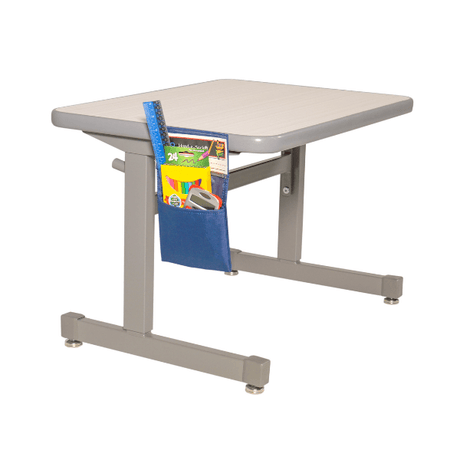 Adjustable height desk with a blue pocket holding school supplies on a white background