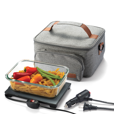 Heetz heated lunch bag with a glass container of pasta and vegetables on a white background