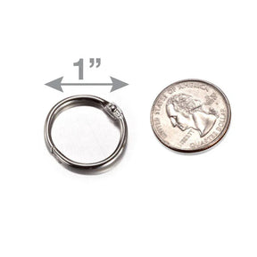 Officemate Loose Leaf Ring shown next to a US quarter for scale, measuring 1 inch.