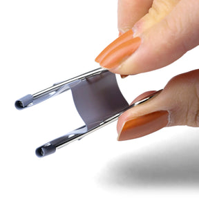 A person opening a large grey Officemate EZ Binder Clip.