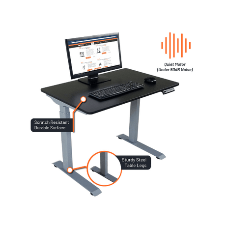 Ergonomic desk with computer setup, highlighting features like a quiet motor, scratch-resistant surface, and sturdy steel legs.