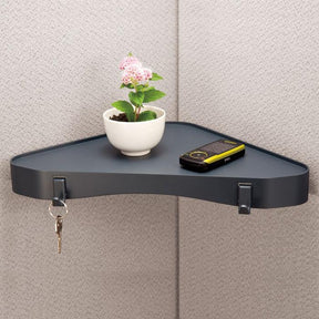 Officemate Verticalmate Cubicle Corner Shelf with a small plant, smartphone, and keys